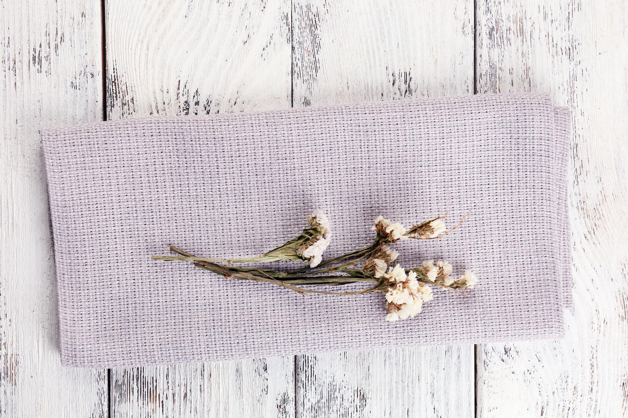 linen table runner with tonal floral embroidery