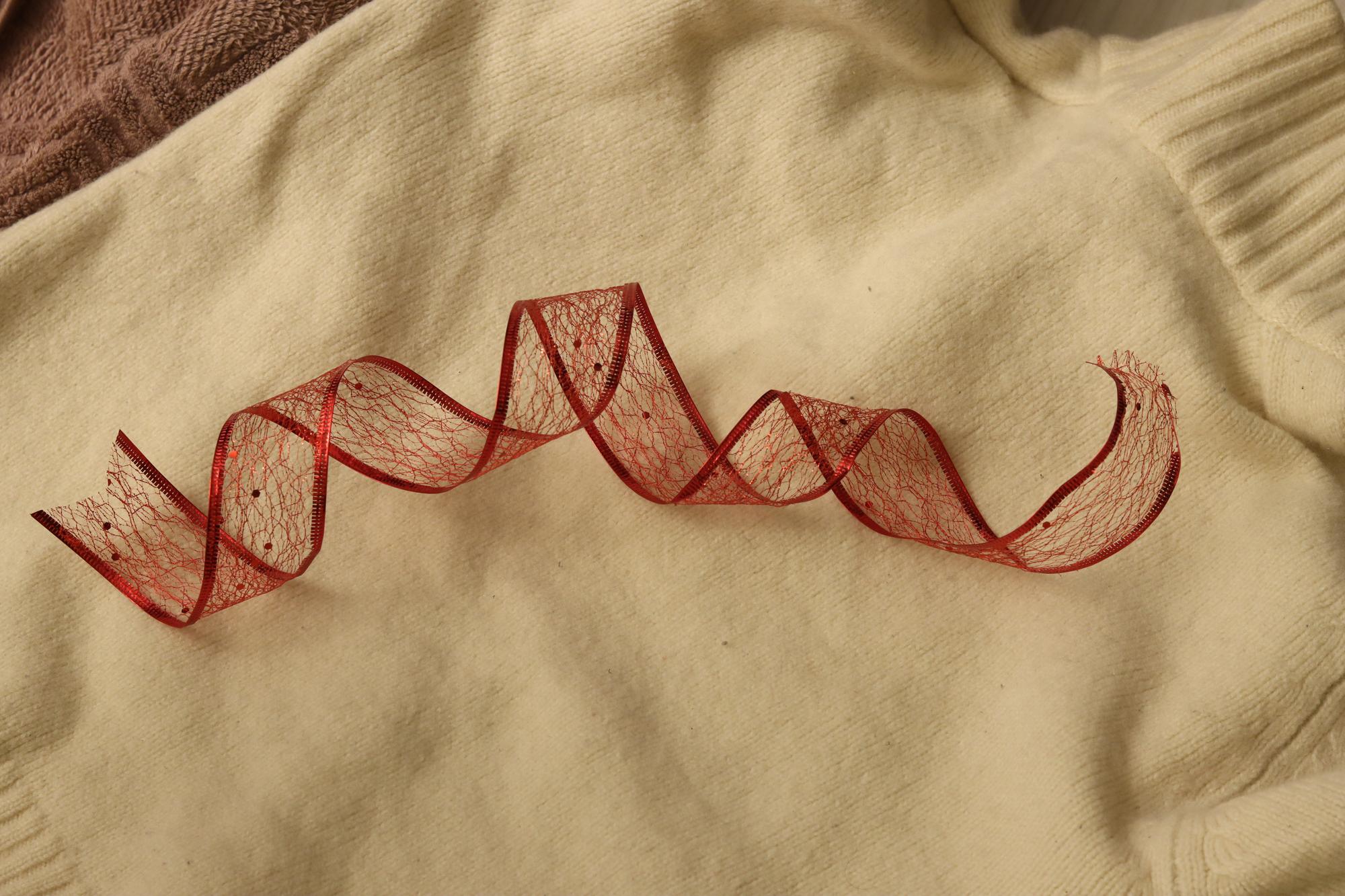 close-up of detailed hand embroidery on linen
